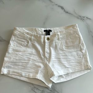 Gently used H&M stretchie white denim shorts, size 6